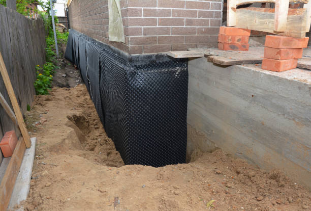 SJ Waterproofing Pros technician performing targeted Foundation Crack Repair assessment in Old Fort, TN